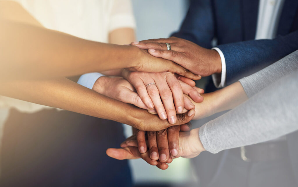 Our team work together, win together. cropped shot of a team of colleague